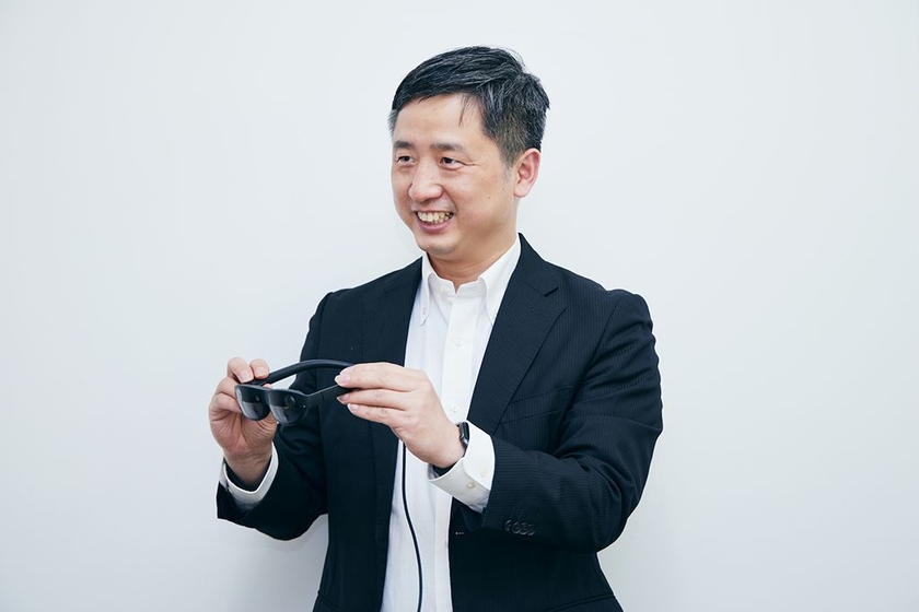 KDDIの王 健
